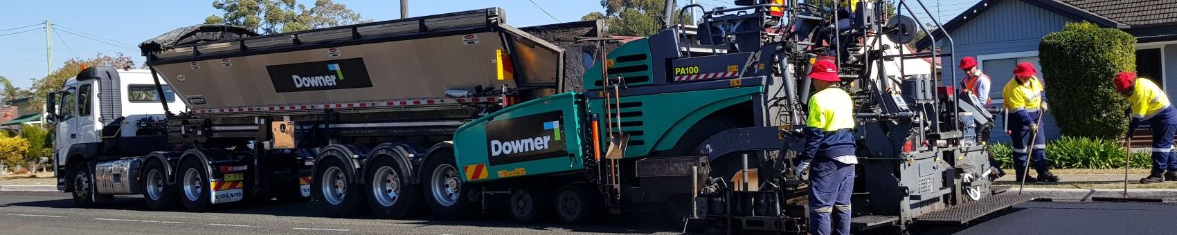 Reconophalt™ Reconophalt, a highly recycled road surface material being applied to surface.