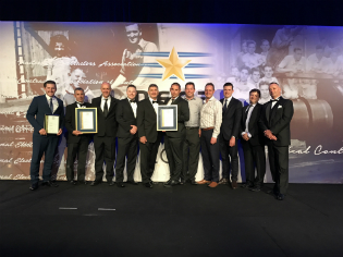 Downer wins two NECA awards